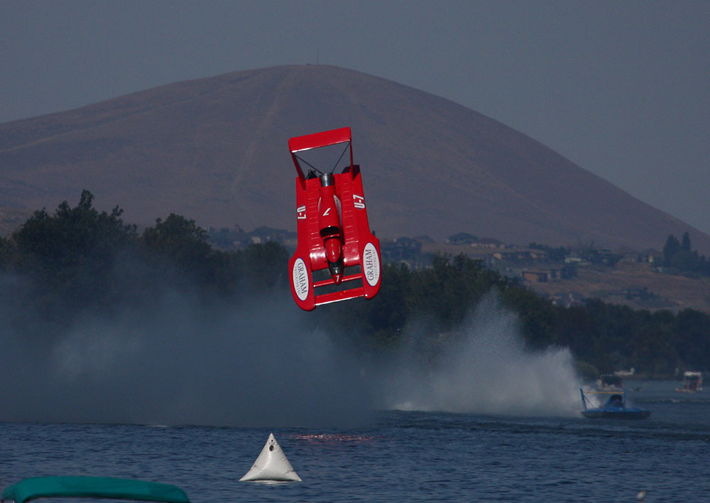 racing boat flipped